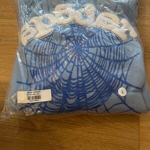 Blue and white rhinestone stone hoodie
Spyder hoodie